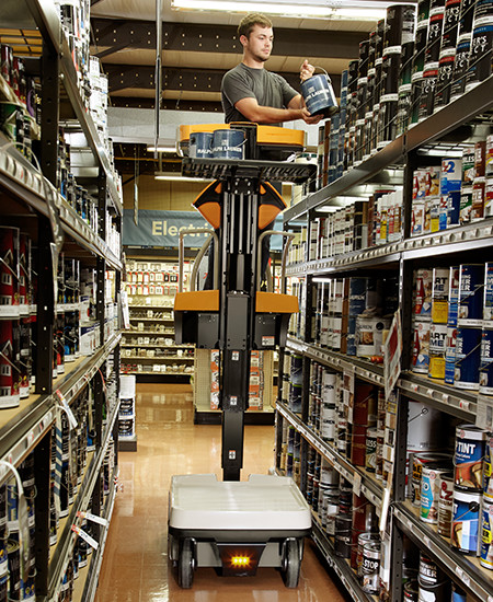 Operator restocking shelves using the Wave order picker