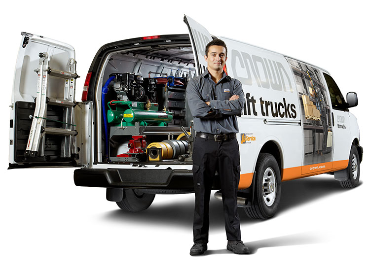 A Crown service technician with Crown service van